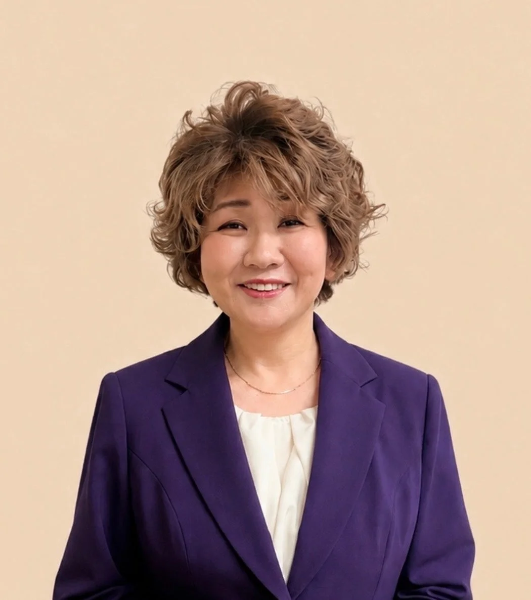 笑顔の咲田笑見氏のポートレート