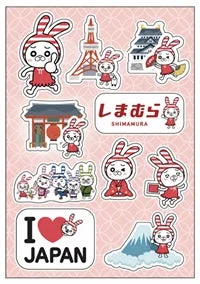 赤い耳のウサギのキャラクターと日本の観光名所が描かれたステッカー