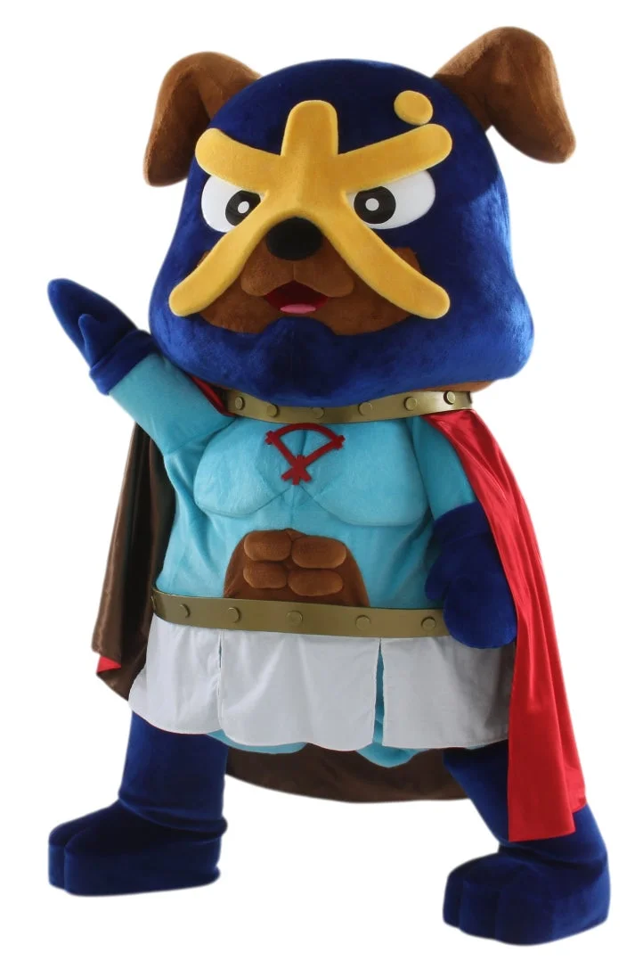 青い体に黄色い「大」の文字が特徴的な犬型のマスコットキャラクター